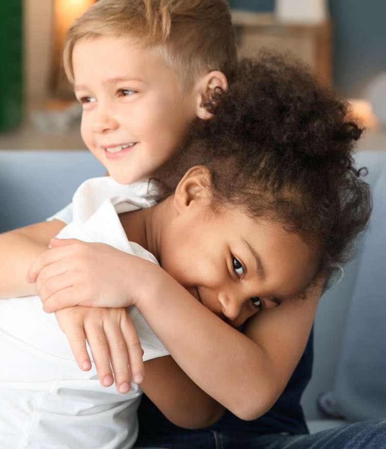 two children hugging