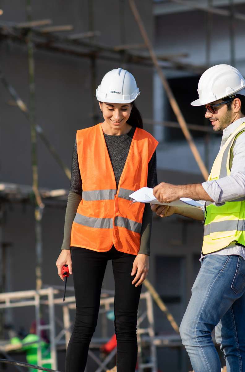 two people on a building site